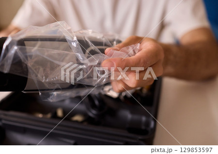 This versatile heat gun is ideal for various DIY projects, home repairs, and renovations 129853597