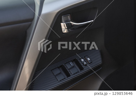 Explore the intricate functions of premium luxury car seat control buttons in detail 129853646