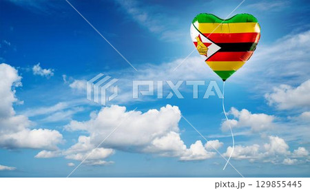 ジンバブエの国旗のハート型の風船と青空 129855445
