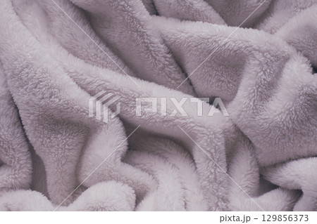 pink soft fluffy blanket textile 129856373