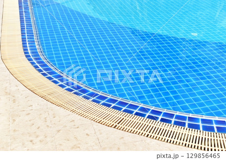 surface of blue swimming pool with water drain surface of blue swimming pool with water drain 129856465