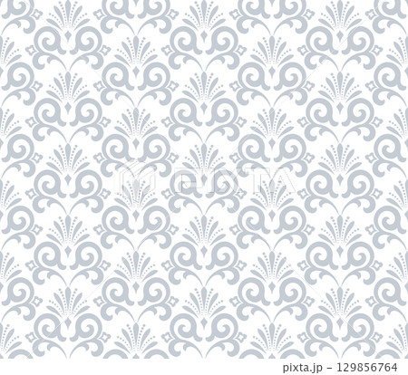 Wallpaper in the style of Baroque. White and gray floral ornament. Seamless vector background. Graphic pattern for fabric, wallpaper, packaging. Ornate Damask flower illustration 129856764
