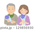 笑顔で花束を持つシニア夫婦_敬老の日_ベクターイラスト 129856930