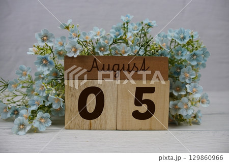 Wooden Calendar Showing the Date of August 5th. Day 5 of August month 129860966