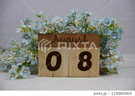 Wooden Calendar Showing the Date of August 8th. Day 8 of August month 129860969