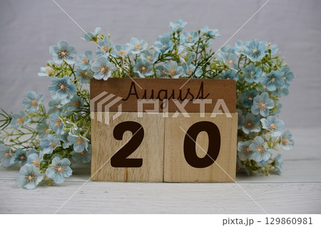 Wooden Calendar Showing the Date of August 20th. Day 20 of August month 129860981