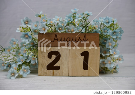 Wooden Calendar Showing the Date of August 21th. Day 21 of August month 129860982