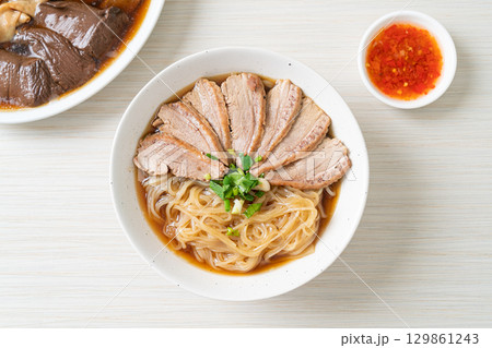duck noodles with stewed duck soup 129861243