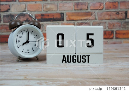 Wooden Calendar Showing the Date of August 5th. Day 5 of August month 129861341
