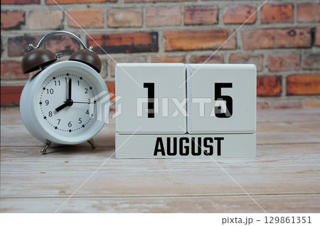 Wooden Calendar Showing the Date of August 15th. Day 15 of August month 129861351