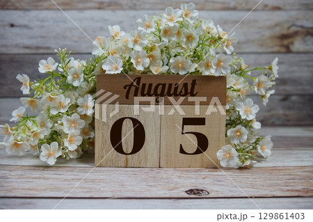 Wooden Calendar Showing the Date of August 5th. Day 5 of August month Wooden Calendar Showing the Date of August 5th. Day 5 of August month 129861403