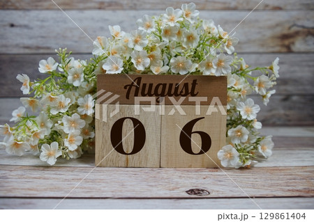 Wooden Calendar Showing the Date of August 6th. Day 6 of August month 129861404