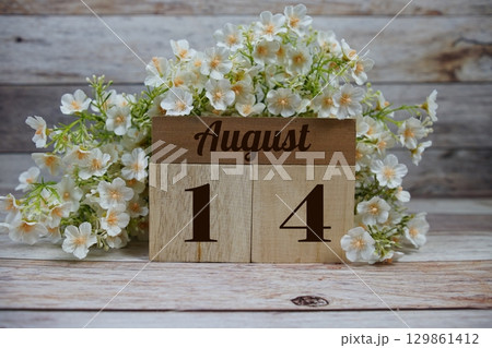 Wooden Calendar Showing the Date of August 14th. Day 14 of August month 129861412