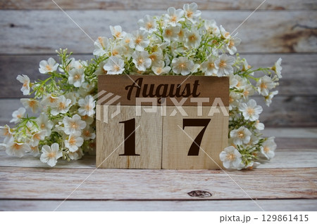 Wooden Calendar Showing the Date of August 17th. Day 17 of August month 129861415