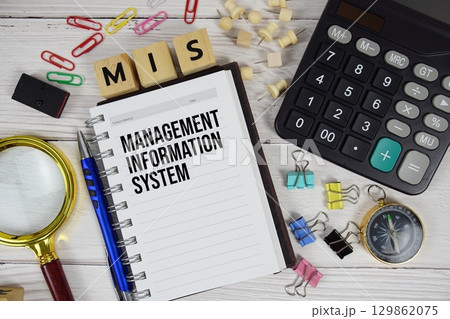 MIS Management Information System acronym on notepad, Business concept background MIS Management Information System acronym on notepad, Business concept background 129862075