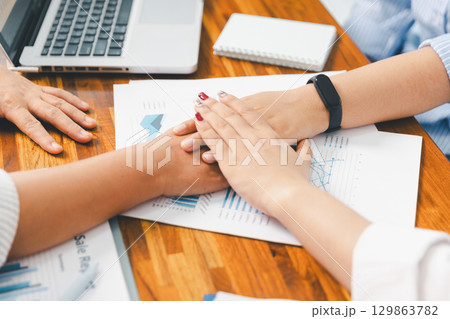 Teamwork meeting, business people in office workplace. Collaboration, technology and worker, employees with touchscreen planning sales, research or financial strategy, staff for conversation, graph 129863782