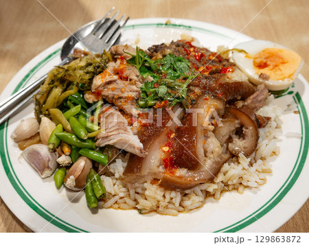 Khao Kha Moo - Thai Stewed Braised Pork Leg with Rice, Served on Plate 129863872