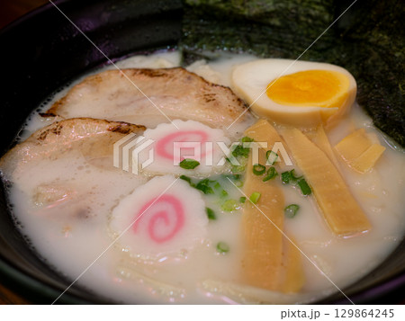 Traditional Japanese Tonkotsu Ramen with Chashu and Soft-Boiled Egg. 129864245