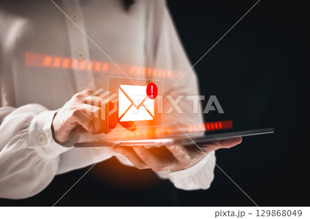 Phishing email alert concept with person using smartphone while surrounded by warning icons symbolizing scam messages cyber threats digital communication security risks. electronic mail alert phishing 129868049