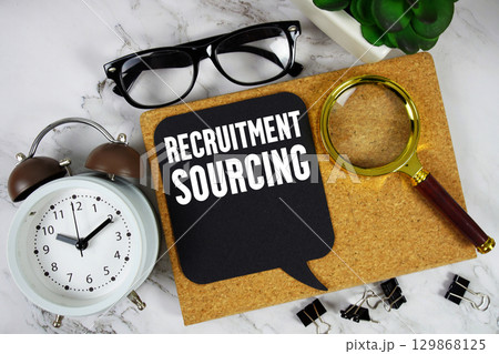 Recruitment Sourcing text with alarm clock and magnifying glass on marble background Recruitment Sourcing text with alarm clock and magnifying glass on marble background 129868125