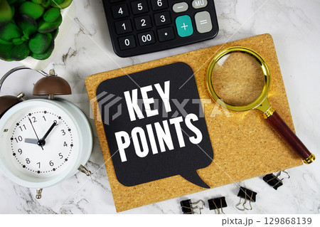 Key Points text with Calculator, alarm clock and magnifying glass on marble background Key Points text with Calculator, alarm clock and magnifying glass on marble background 129868139