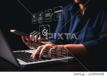 Woman using tablet, laptop futuristic digital interface icons manages checklist online quality control document management system streamlining workflow approval, advanced concept of modern efficiency 129868266