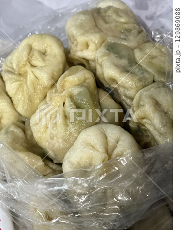 Jjinppang, soft and fluffy steamed buns filled with sweet red bean paste or savory fillings. A warm, comforting Korean snack perfect for any time of the day. Jjinppang, soft and fluffy steamed buns filled with sweet red bean paste or savory fillings. A warm, comforting Korean snack perfect for any time of the day. 129869088