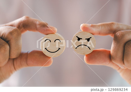 Customer showing rating with happy icon, Customer satisfaction survey concept, Positive feedback from happy client satisfaction with quality of service, marketing surveys, ratings, review, copy space 129869234