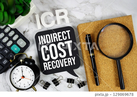 ICR Indirect Cost Recovery acronym with calculator, alarm clock and magnifying glass, Business concept background 129869678