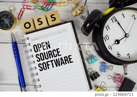 OSS Open Source Software acronym on notepad, Technology and software concept background OSS Open Source Software acronym on notepad, Technology and software concept background 129869721