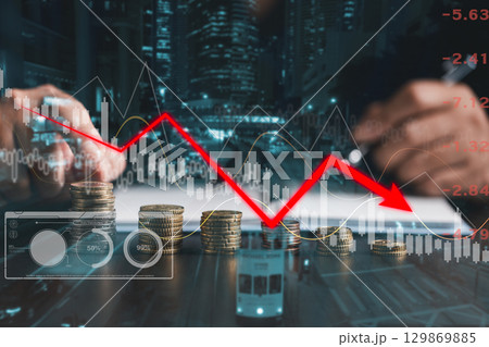 Concept of economic collapse by falling graph, chart, highlighting global recession fueled by inflation, stock market crash, financial crisis, falling income, GDP decline, capital reduction. 129869885