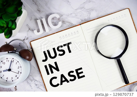 JIC Just In Case acronym on notepad, Business concept background JIC Just In Case acronym on notepad, Business concept background 129870737