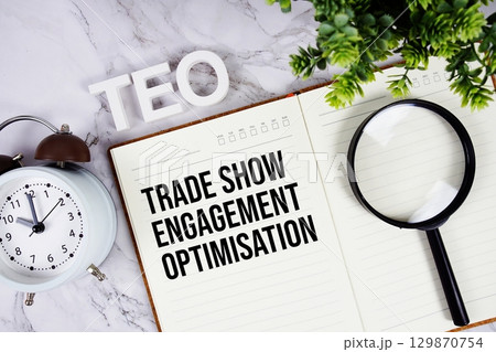 TEO Trade Show Engagement Optimisation acronym on notepad, Business concept background TEO Trade Show Engagement Optimisation acronym on notepad, Business concept background 129870754