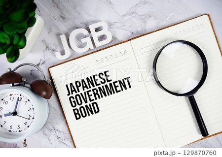 JGB Japanese Government Bond acronym on notepad, Business concept background 129870760