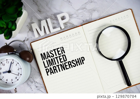 MLP Master Limited Partnership acronym on notepad, Business concept background MLP Master Limited Partnership acronym on notepad, Business concept background 129870784