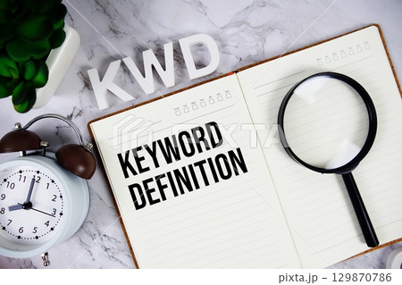 KWD Kuwaiti Dinar acronym on notepad, Financial concept background 129870786