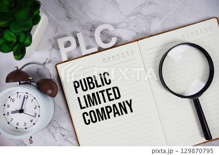 PLC Public Limited Company acronym on notepad, Business concept background PLC Public Limited Company acronym on notepad, Business concept background 129870795