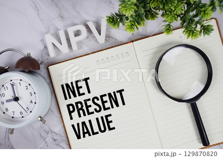 NPV Net Present Value acronym on notepad, Business concept background 129870820