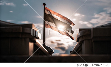 The Thai flag flutters, the Thai spirit never gives up. 129874898