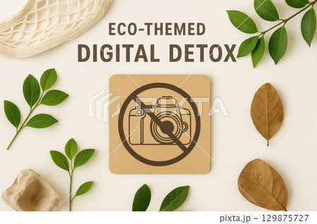 Eco themed digital detox concept with no camera sign surrounded by green and brown leaves promoting nature connection and reducing screen time for mental clarity and calmness 129875727