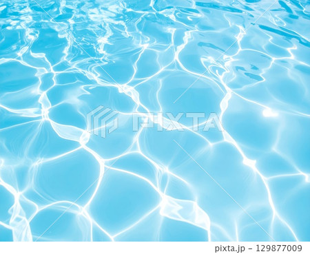 Light blue water with ripples and waves background 129877009