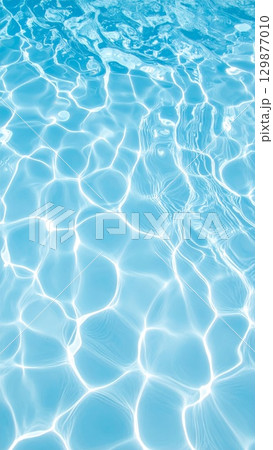 Light blue water with ripples and waves background 129877010