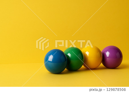 Red, orange, green, and blue marbles with words diversity, inclusion, equity, and fun, symbolizing unity through colorful representation Red, orange, green, and blue marbles with words diversity, inclusion, equity, and fun, symbolizing unity through colorful representation 129878508