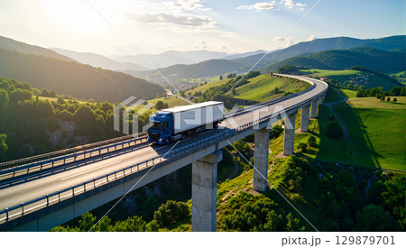 山間の高架橋を走る青い大型トラック 山間の高架橋を走る青い大型トラック 129879701