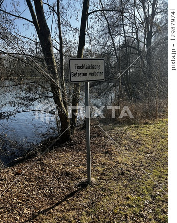 A sign reading "Fish spawning area. No entry" near the town of Herstel, Germany A sign reading "Fish spawning area. No entry" near the town of Herstel, Germany 129879741