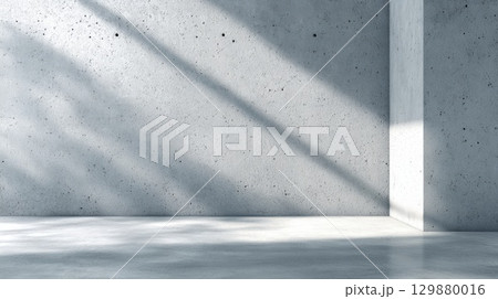 Minimalist Concrete Wall with Sunlight Shadows in Modern Interior Setting 129880016