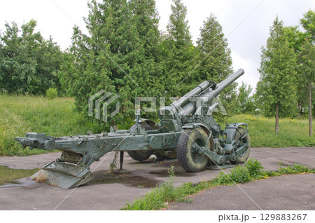 An old cannon against the backdrop of summer 129883267