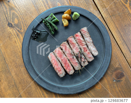 Hitachi wagyu striploin steak, authentic japanese cuisine at japanese charcoal grill restaurant and bar. Hitachi wagyu striploin steak, authentic japanese cuisine at japanese charcoal grill restaurant and bar. 129883677