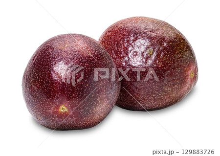 Closeup of ripe passion fruit or passionfruit isolated on white background. 129883726