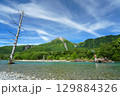 快晴に緑が映える焼岳 129884326